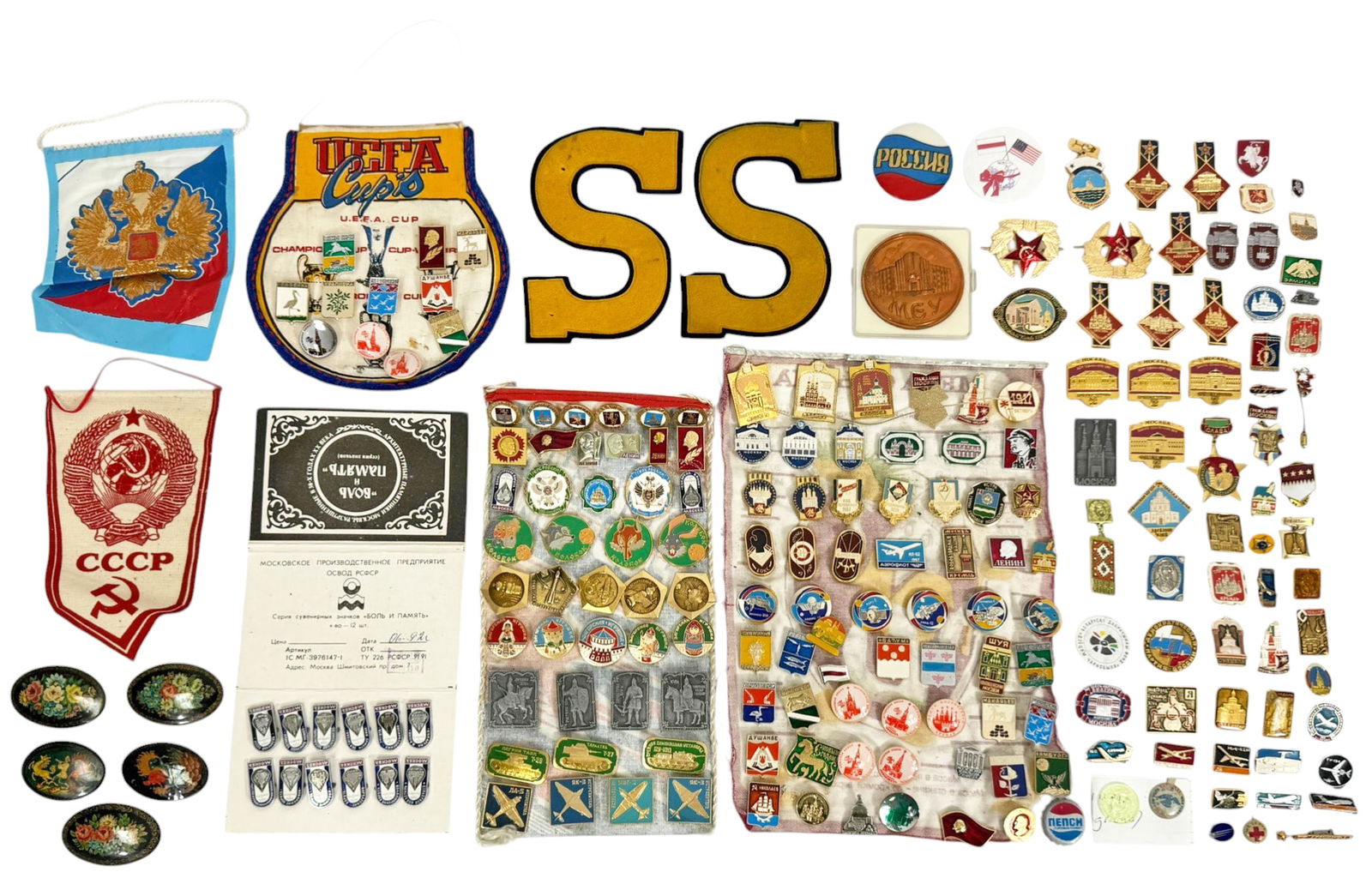 Soviet Russian Pins Badges Medals & Lacquer Pins: Soviet Russian collection of vintage pins, badges and related memorabilia including over one hundred examples. The group features enamel pins depicting Soviet era themes such as space exploration