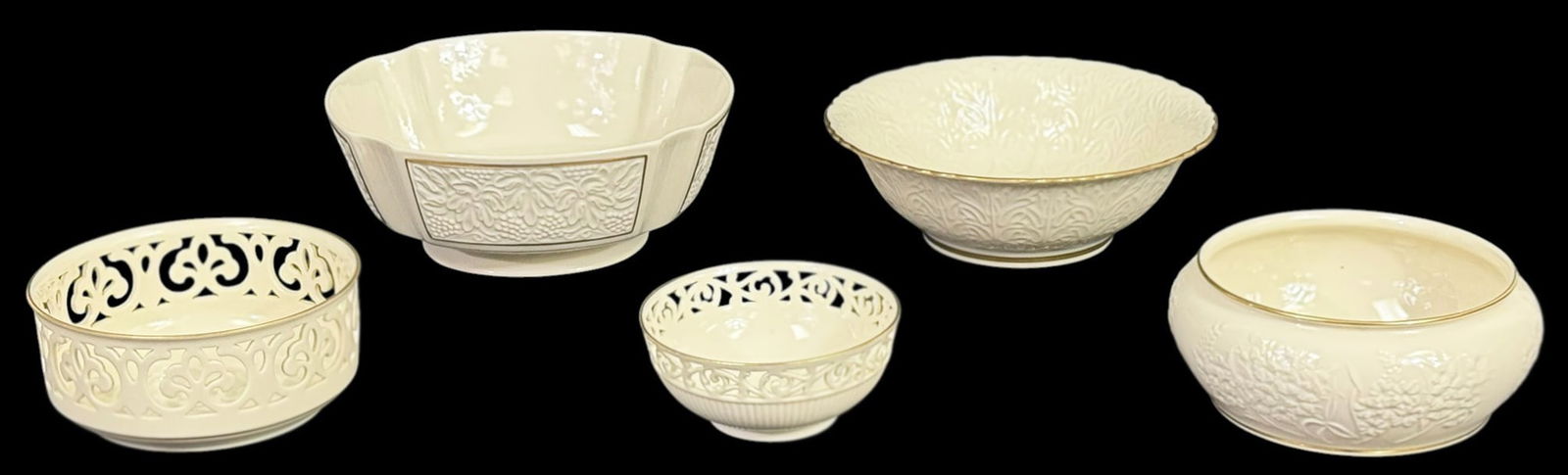 Lenox Gold Trim Porcelain Service Bowls 5pc SET: Lot of five Lenox ivory china bowls including a Masterpiece flower bowl, a Brittany pattern bowl, a Tracey small bowl, a Bordeaux centerpiece bowl, and an additional pierced rim decorative bowl. Marke