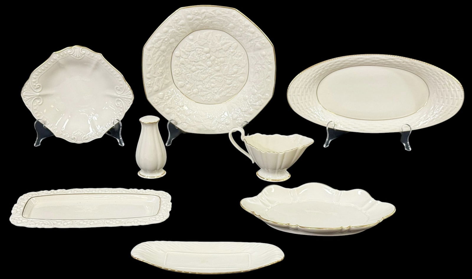 Lenox Porcelain Serverving Platter Dishes 8pc LOT: Lot of eight Lenox porcelain serveware items including an oval serving platter with basketweave border, a molded octagonal floral relief plate, a scalloped rim dish, a small handled cream or sauce ves