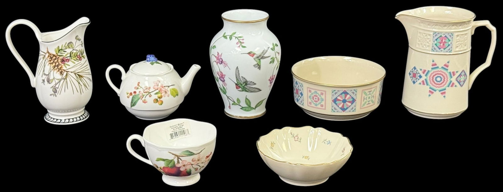 Lenox Porcelain Tableware Service Items 7pc LOT: Lot of seven Lenox assortment of fine porcelain decorative and functional pieces including a handled pitcher with botanical motif, a small teapot with fruit decoration, a matching cup, a floral decora