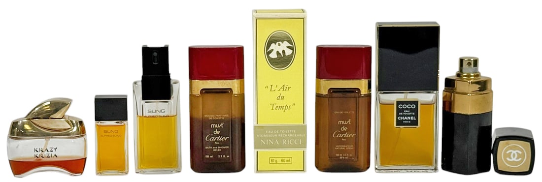 Chanel Cartier Nina Ricci & More Perfume Bottles: Group of nine vintage designer perfume bottles including Coco Chanel Eau de Toilette, Chanel No 5 spray cologne, Must de Cartier bath and shower gel and eau de toilette examples, Nina Ricci L Air du T