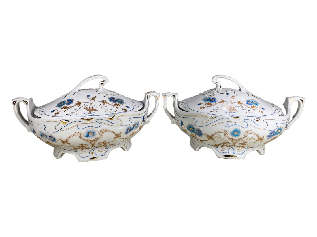 Copeland Style Antique Porcelain Tureens, Pair: Copeland style pair antique porcelain covered tureens, oval forms with twin handles and domed lids, hand painted blue floral decoration with gilt accents on white ground. The largest measures approxim