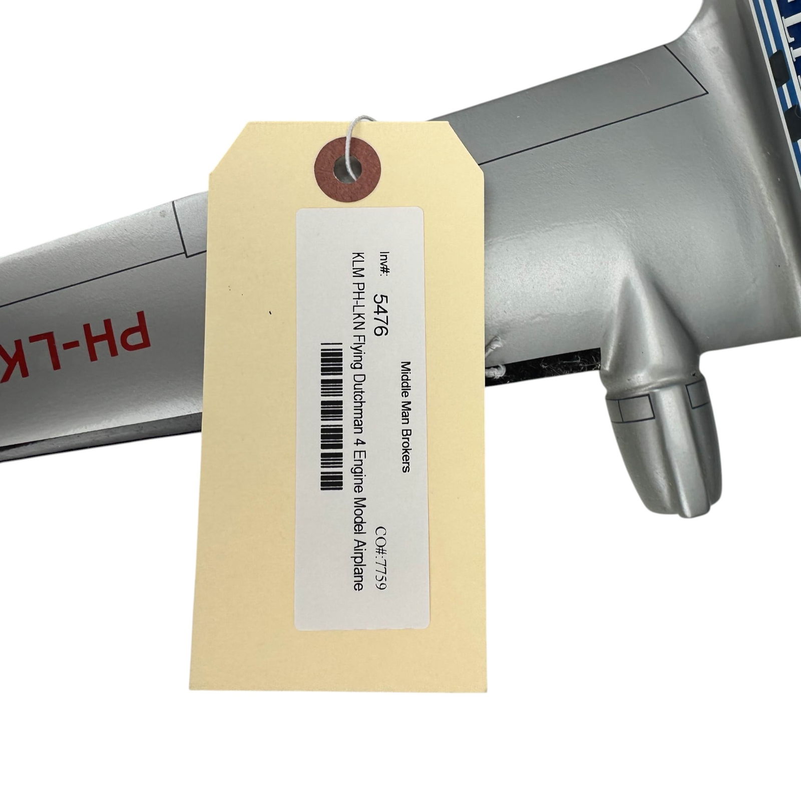 KLM PH-LKN Flying Dutchman 4 Engine Model Airplane: Model airplane marked KLM “The Flying Dutchman” with registration PH-LKN. Features four engine design, printed livery, cockpit windows, and Dutch flag tail markings. Includes wing supports wit