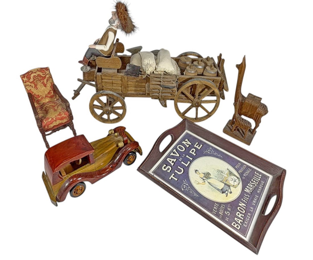Wood Chariot, Car, Llama, Tray & Resin Chair 5pcs: Decorative group of five items, includes carved wood model car, rustic wagon with figure and cargo, carved llama, upholstered miniature chair, and wooden tray with Savon de la Tulipe design. The large