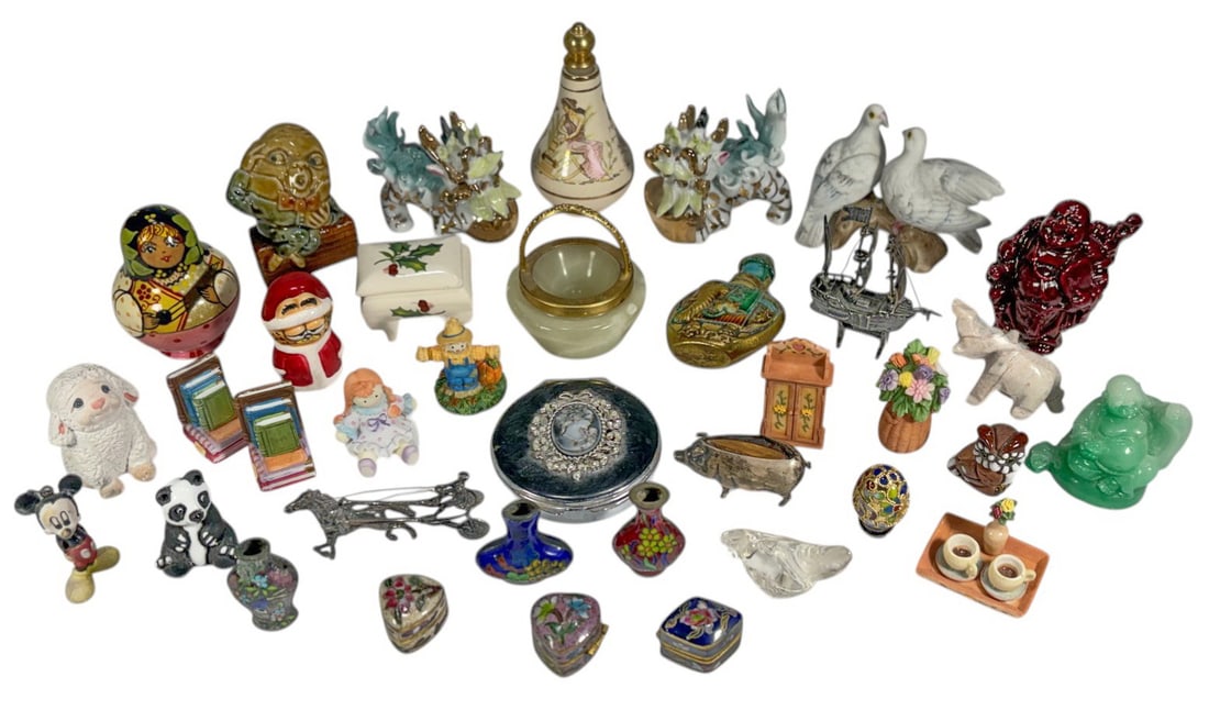 Assorted Metal, Porcelain, Resin, Glass Fig 36pcs: Mixed group of 36 decorative figurines and miniatures in porcelain, resin, glass, and metal, including animals, cloisonne vases, trinket boxes, enameled eggs, jade tone carving, metal ship, and novelt