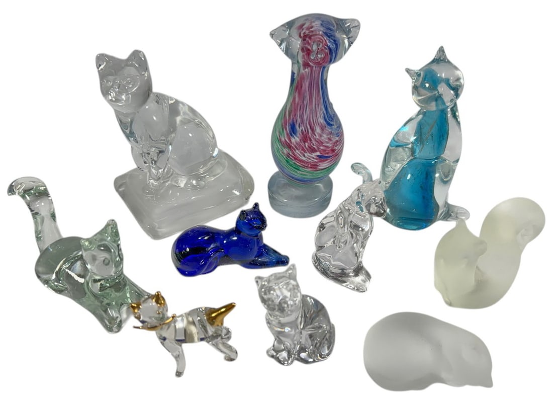 The Franklin Mint & Others Cats Glass Fig 10pc LOT: The Franklin Mint collection of art glass cat figurines, includes clear, frosted, and colored examples with swirl designs, various poses and finishes, some marked to the base. The largest measures app