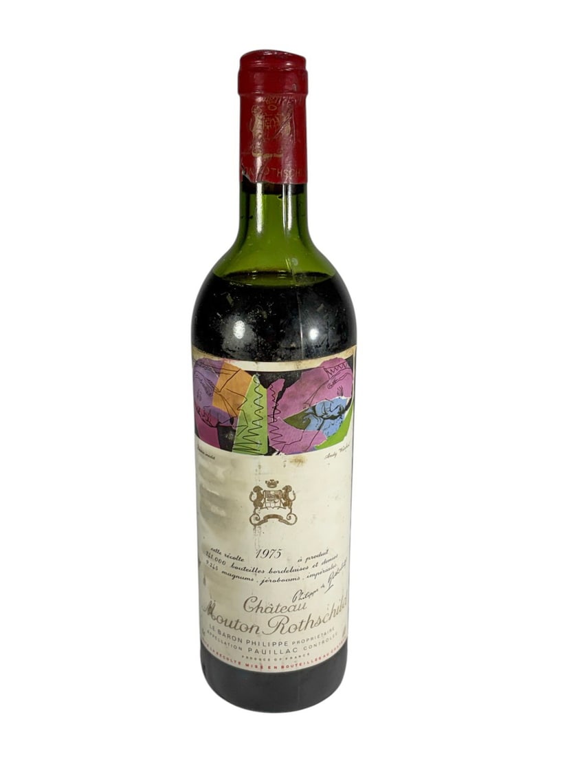 1975 Chateau Mouton Rothschild by Andy Warhol: 1975 Chateau Mouton Rothschild Pauillac Red Wine Bottle feauturing the iconic Artist designed label by Andy Warhol. Produced under Baron Philippe de Rothschild, Appelation Pauillac Controlee and bottl
