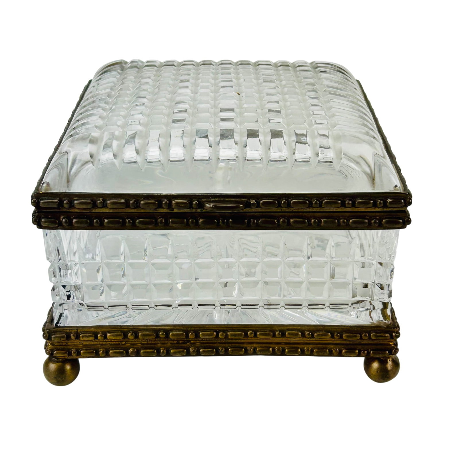 Castilian Bronze Mounted Lead Crystal Jewelry Box: Castilian lead crystal hinged trinket coin storage box. Features geometric inspired cut designs to the paneled lid and the four sides. Bronze mounted hardware to the rims and base. Star burst cut base