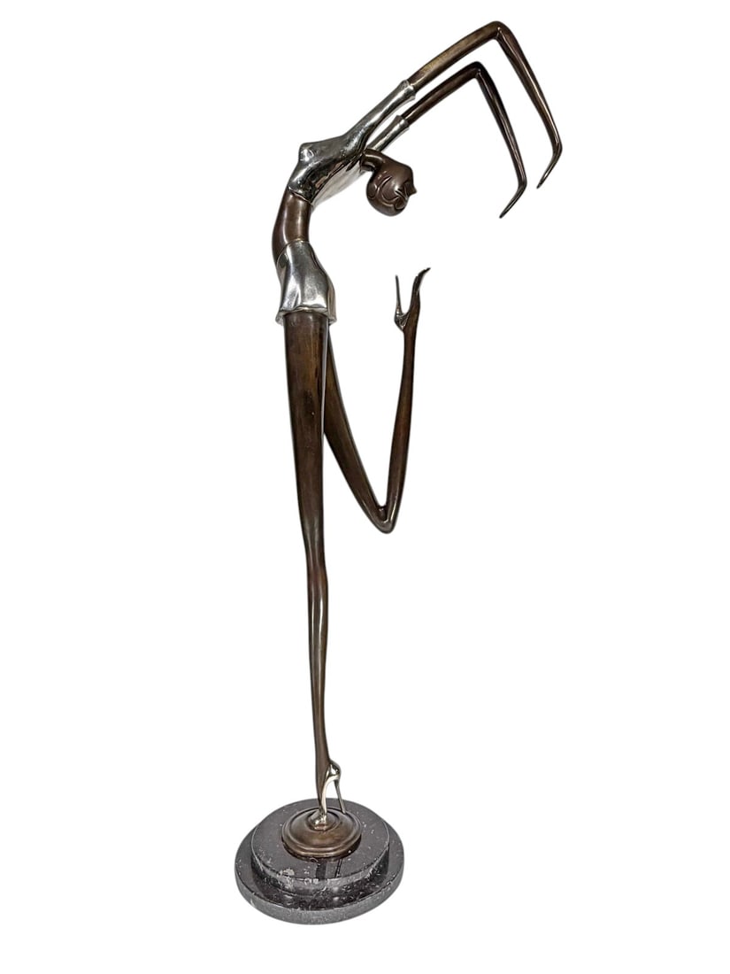 Large Hagenauer Style Bronze Dancer Sculpture: 20th Century Bronze sculpture depicting a dancer with elongated form. Brown patina with chromed accents. Mounted on a black marble base. Illegible signature present on bronze base. Dimensions: 48.5 X 