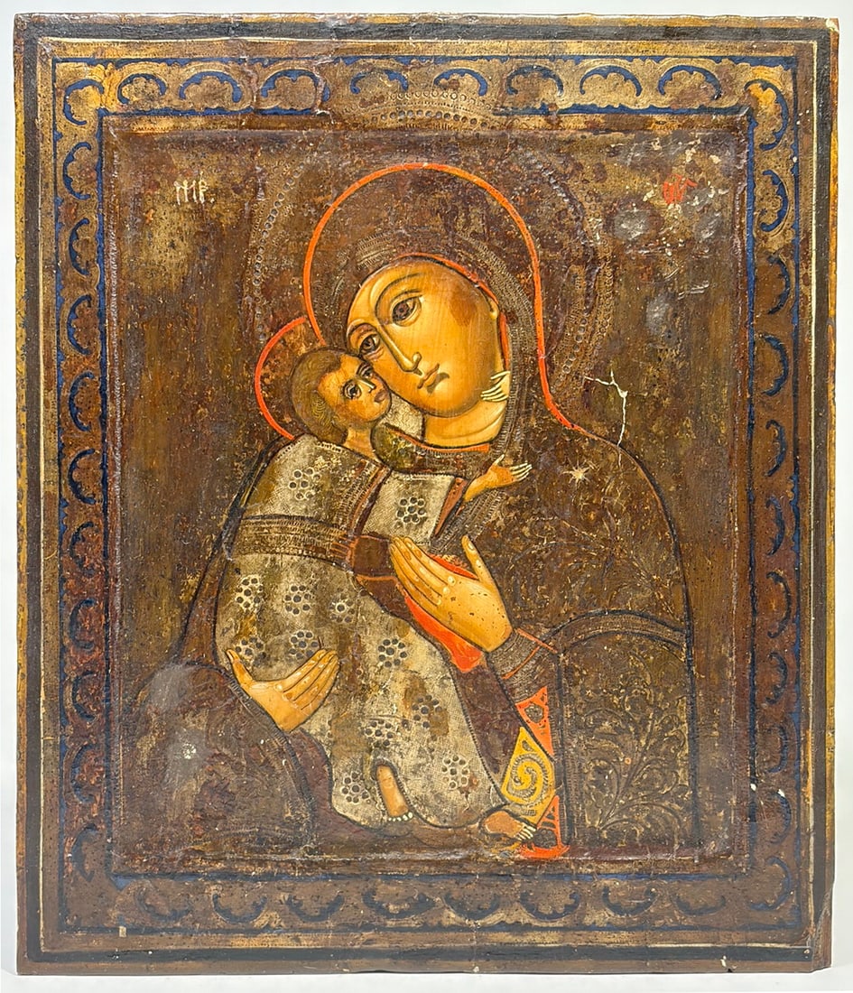 Russian Icon of Our Lady of Vladimir, 18th-19th C: Russian Orthodox icon of Our Lady of Vladimir, Eleusa type with Christ Child in close embrace, inscribed 'Mater.' Painted on wood panel with recessed field, gilt and blue border with scrollwork and pu