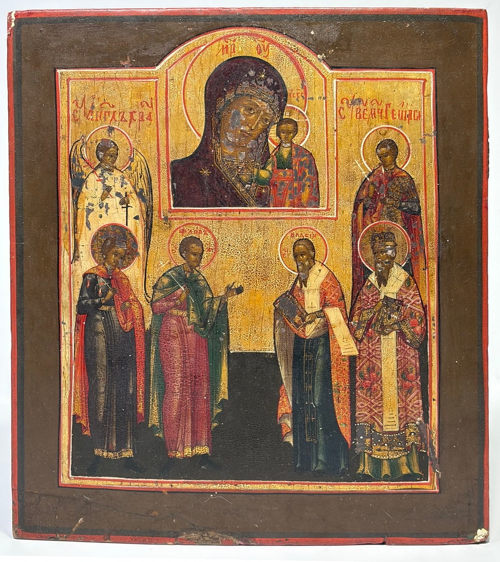 Russian Orthodox Figural Icon Panel, 18th-19th C: Russian Orthodox icon on wood panel, late 18th to mid-19th century, multi-figure composition with inscriptions, Our Lady of Kazan above, saints below, gold, red, and brown tones, recessed field and cr
