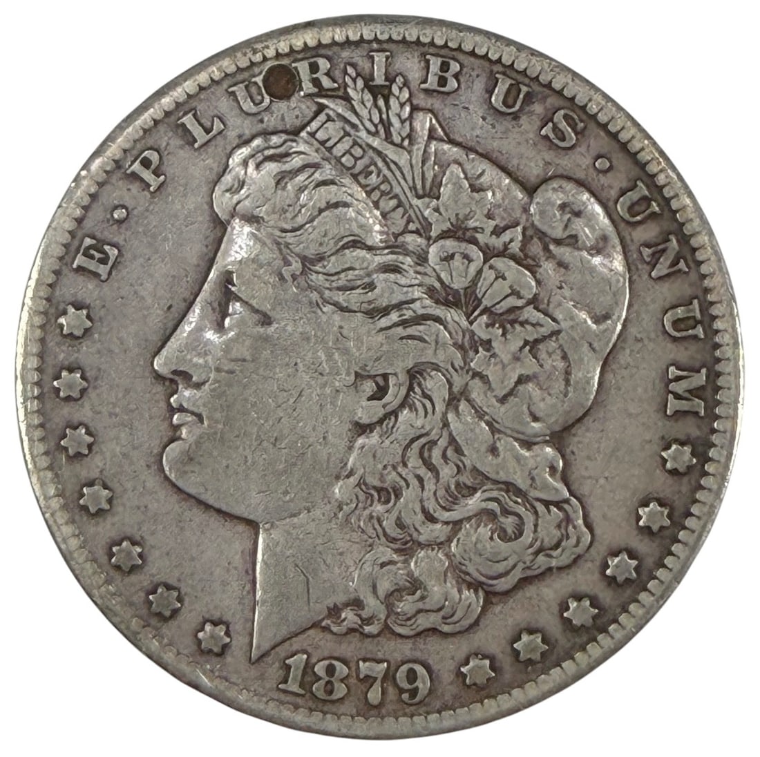 1879 CC Morgan Silver Dollar Coin Carson City: United States Mint, Morgan silver dollar dated 1879 CC, approximately 1.5 inches diameter, 26.5 grams, circulated, 90 percent silver, early Carson City issue. Condition: Good overall condition having 