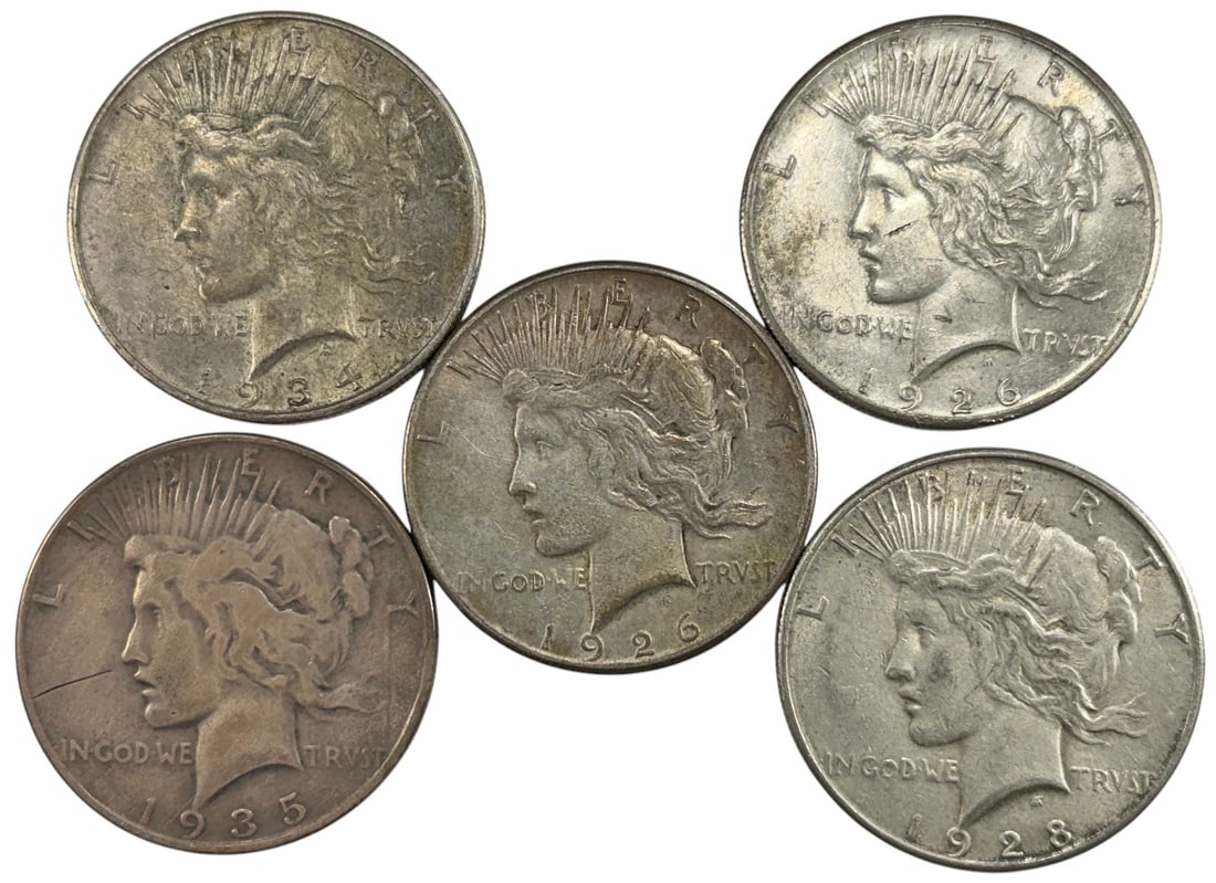 1926/28/34/35 Peace Silver Dollar Coins 5pcs: United States Mint, group of five Peace silver dollars dated 1926, 1928, 1934, and 1935, approximately 1.5 inches diameter, combined weight 133.1 grams, circulated, Lady Liberty design by Anthony De F