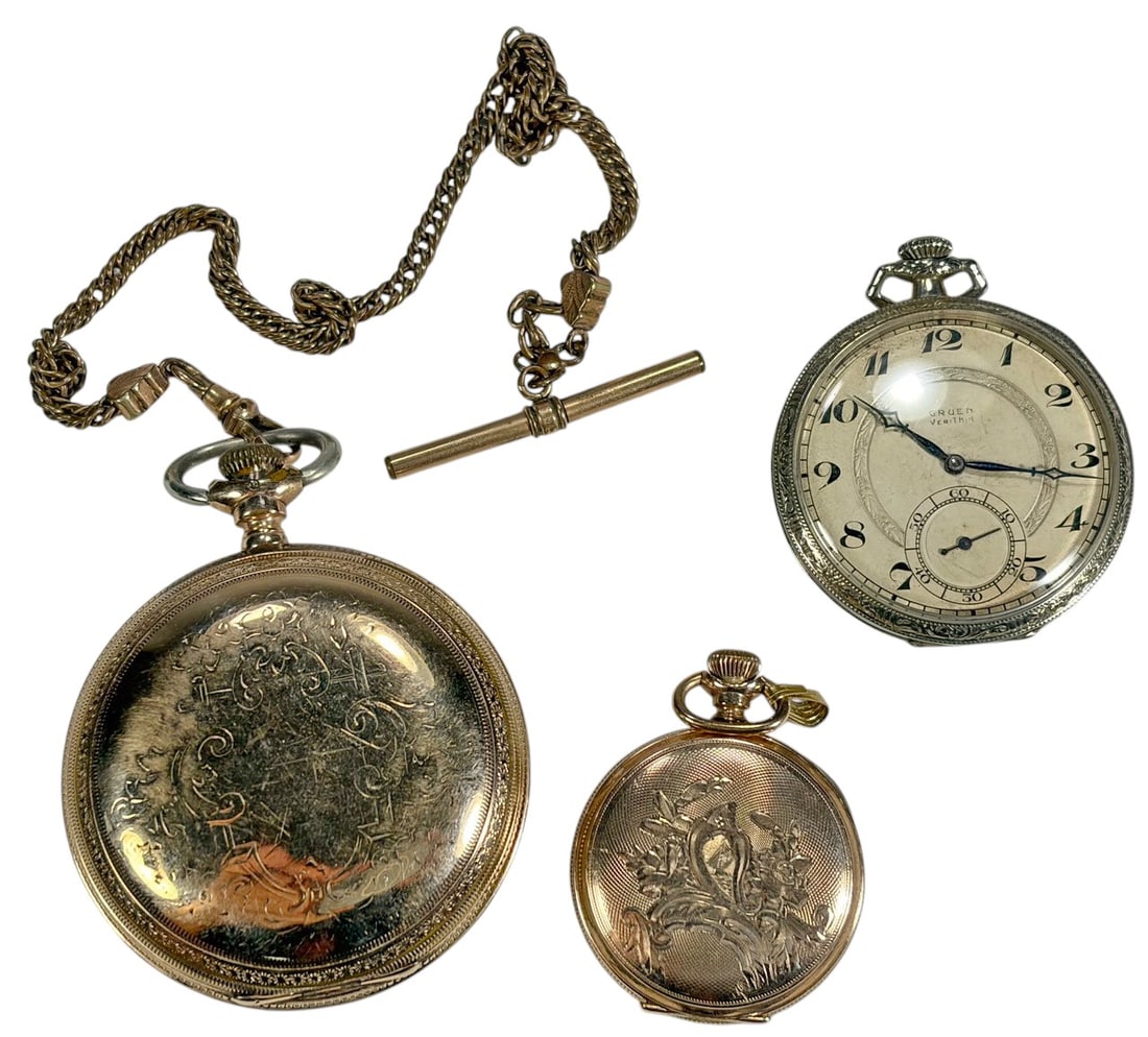 Waltham, Elgin & Gruen Veri-Thin Pocket Watch 3pcs: Group of three antique pocket watches by Waltham, Elgin, and Gruen, including Verithin example, with chain, gold tone cases with engraved decoration. The largest measures approximately 2.85 inches tal