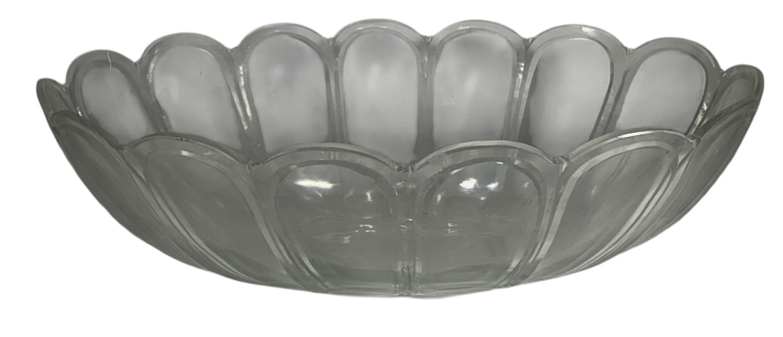 Vintage Centerpiece Scalloped Design Glass Bowl: Clear pressed glass centerpiece bowl with oval form, scalloped lobed sides, paneled detailing, and starburst base, low profile, early to mid 20th century. Dimensions: 6 X 18.25 X 12.5 in. Condition: