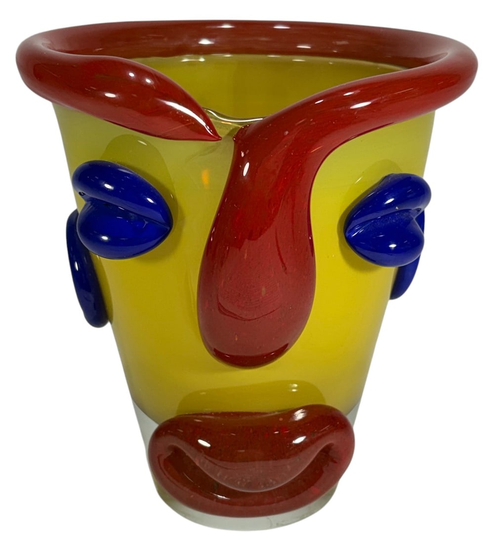 Jaroslav Svoboda (Czech) Art Glass Clown Face Vase: Jaroslav Svoboda Czech art glass clown face vase, thick cased yellow glass with clear base, applied red and cobalt features, stylized expressive form with protruding nose and bold facial details. Dime
