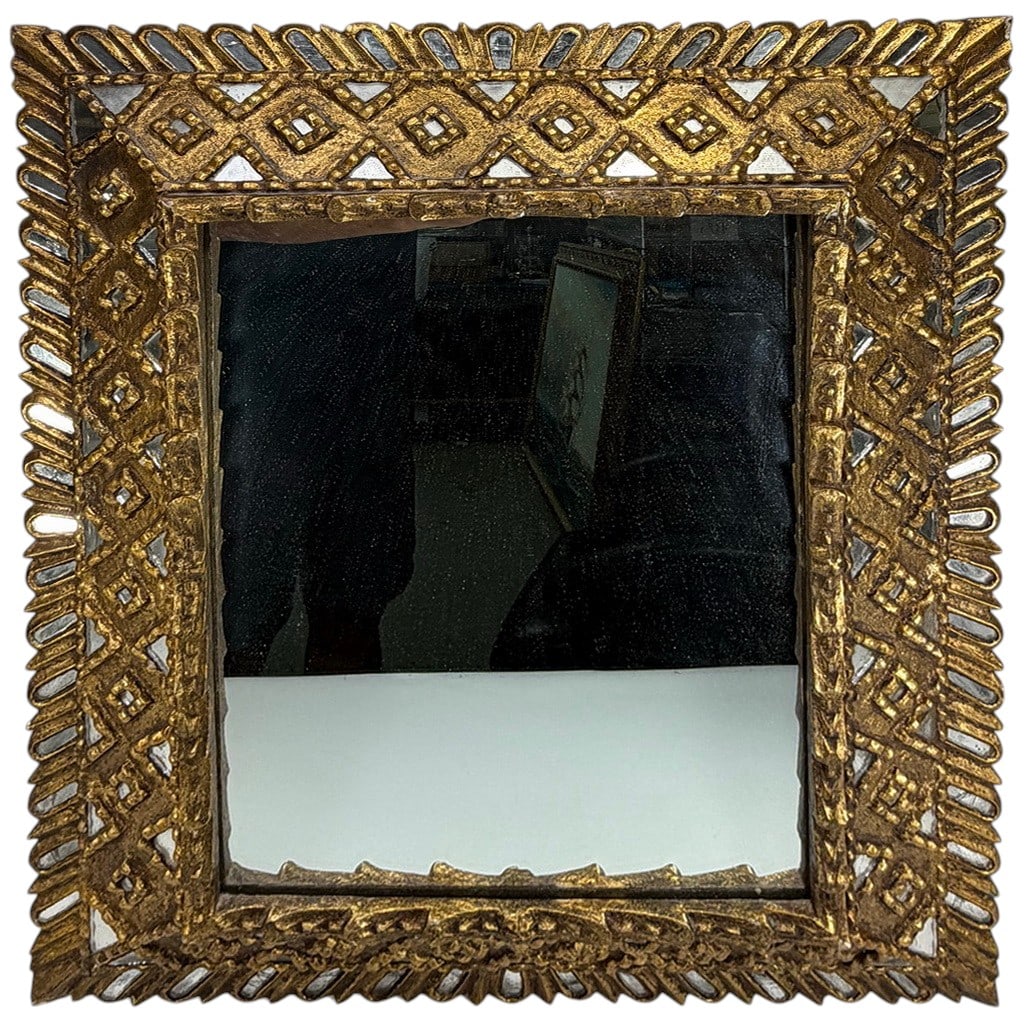 Vintage Colonial Giltwood Sunburst Wall Mirror: Colonial style, giltwood rectangular wall mirror with carved geometric and lattice frame, gilt finish with inset mirrored accents, decorative design. Dimensions: 25.5 X 20.5 X 2.5 in. Condition: Go