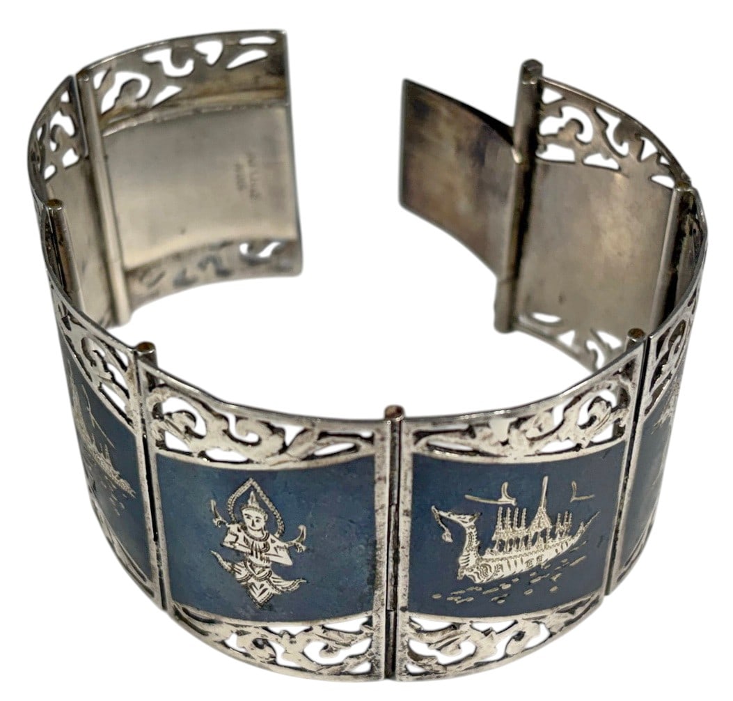 Siam Enameled Sterling Panel Link Cuff Bracelet: Vintage sterling silver cuff bracelet composed of nine rectangular panel links, each adorned with hand-enamel and finely engraved traditional Siamese (Thai) motifs including mythological figures, temp