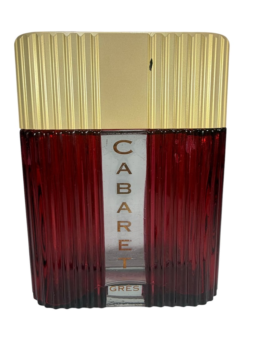 Cabaret By Gres For Man Cologne Bottle Spray: Large decorative cologne bottle by Gres, 'Cabaret' for men, empty. Ribbed translucent red body with central clear panel and gold CABARET lettering, gold tone fluted cap with red G logo, Art Deco inspi
