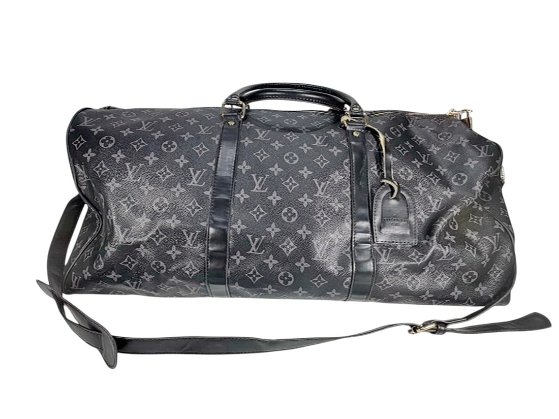 Louis Vuitton Style Monogram Travel Duffle Bag: Louis Vuitton style monogram travel duffle bag, black coated canvas with gray LV style monogram pattern, black leather trim and dual rolled handles, zip top closure with gold tone hardware, includes m