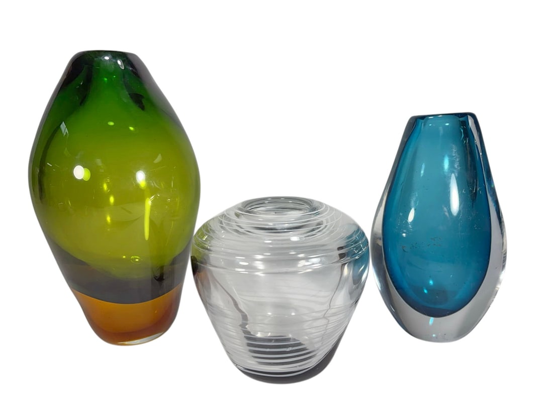A. Jablonski, Poland & Others Art Glass Vases 3pcs: Three art glass vases including one signed Adam Jablonski example with clear body and internal swirl decoration, one blue cased glass vase with clear outer layer, and one green to amber gradient vase 