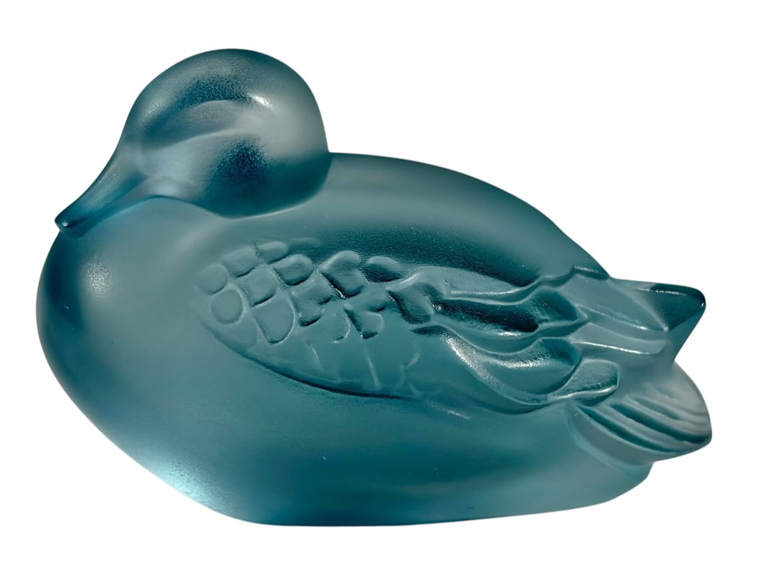 Lalique France Ice Blue Glass Duck Figure Signed: Lalique molded glass duck figure in ice blue satin finish, made in France. Features a stylized resting form with detailed wing pattern and frosted surface typical of Lalique production. Signed on the 