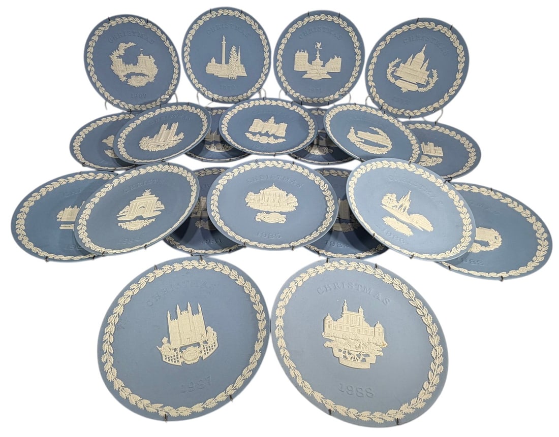 Wedgwood England Christmas Plates 20pc LOT: Group of twenty (20) Wedgwood jasperware blue and white Christmas plates, dated 1969-1988. Each plate features a different subject with classical relief decoration. Marked 'Wedgwood Made in England' t