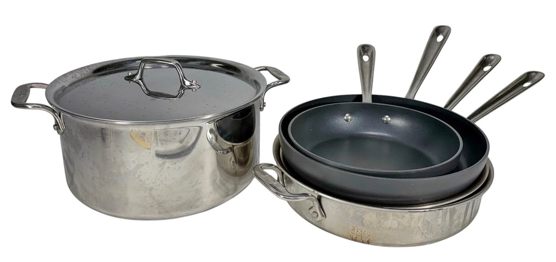 All Clad Stainless Steel Cookware Pot & Pans 5pcs: All Clad, five piece stainless steel cookware lot including stock pot with lid and four frying pans in various sizes, D3 Stainless tri ply construction, marked 'All Clad Metalcrafters.' The largest me