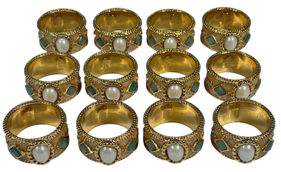 Mike & Ally Gilt Metal Napkin Rings 12pc LOT: Mike and Ally set of twelve gilt metal napkin rings, beaded borders, faux pearl cabochons, green geometric stones, clear crystal accents, textured enamel style finish, marked interior 'Mike and Ally.'
