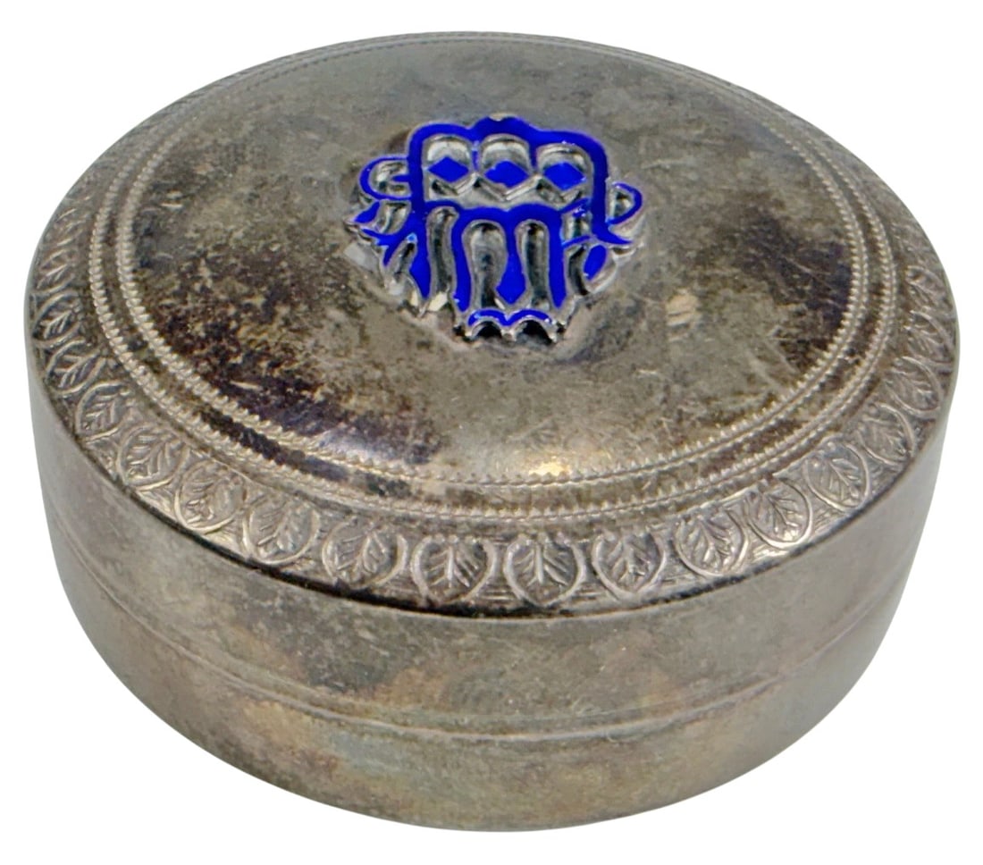 Islamic Sterling Silver 925 Enamel Pill Box w/ Lid: Sterling silver pill box, marked '925' on the interior. Circular form with engraved border decoration. The lid features a blue enamel element with likely Islamic inscription. The total weight is appro