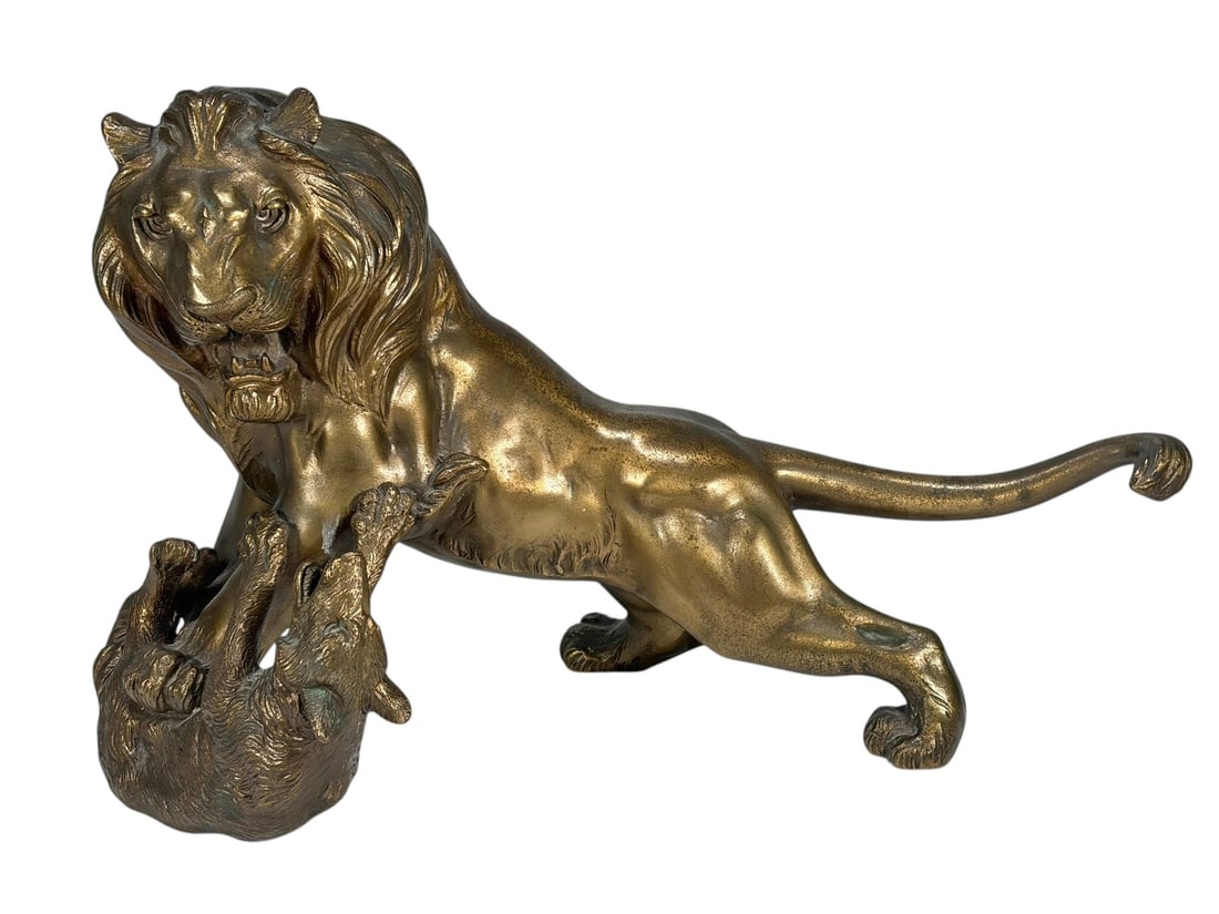 Vintage Brass Lion Hunting Hyena Sculpture: Vintage cast brass lion and hyena sculpture, dynamic hunting scene, detailed musculature and fur, gilt tone with dark patina, naturalistic wildlife form, mid to late 20th century. Dimensions: 9.75 X 1