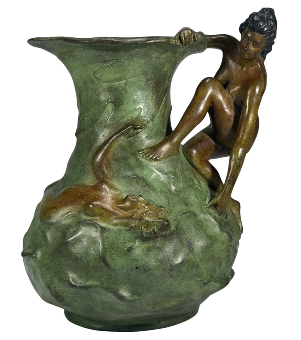 After Lucien Alliot Art Nouveau Pitcher by Armiet: After Lucien Alliot Art Nouveau style figural pitcher by Armiet, sculptural nude female form with integrated handle, green patinated surface, relief figure to body, impressed Armiet mark, decorative c