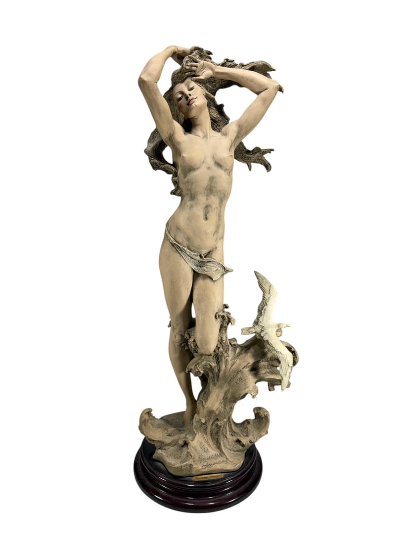 Giuseppe Armani The Sea Wave Figure 1006-T: Porcelain figurine titled 'The Sea Wave' by Giuseppe Armani, model 1006-T. Limited edition example numbered 571/1500. Mounted on a wooden base with a front plaque bearing the artists name. Signed to t