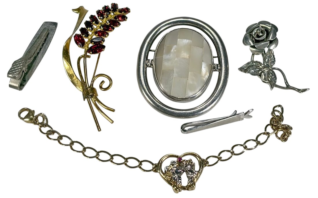 Sterling 925 Brooches & Disney Bracelet 6pc LOT: Group lot of six sterling silver accessories including brooches and a Disney bracelet. Includes a gold-tone sterling brooch with ruby-colored stones, a circular brooch with mother-of-pearl inlay, a st