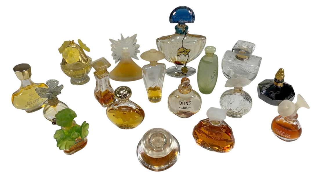Miniature French Perfume Bottles Collection 17pcs: Group of seventeen miniature perfume bottles by assorted makers including Guerlain Shalimar, Christian Dior Dune, Versace, and Nina Ricci, in molded and frosted glass with decorative stoppers, some wi