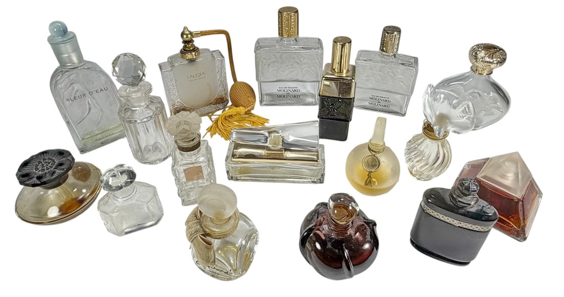 Designer Perfume Bottles Collection 17pc LOT: Group of seventeen assorted perfume bottles by makers including Guerlain, Dior, Nina Ricci, Lalique, Molinard, Gres, and Versace, in molded and frosted glass with decorative stoppers, some labeled wit