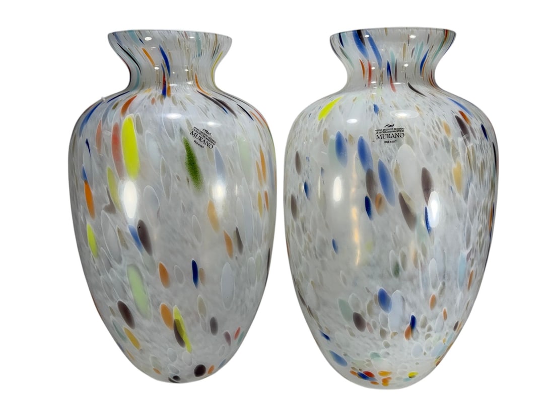 Pair of Italian Murano Style Art Glass Vases: Pair of large Murano style art glass vases featuring white frosted bodies with multicolor confetti and controlled bubble decoration. Each vase with flared ruffled rim and original factory label readin