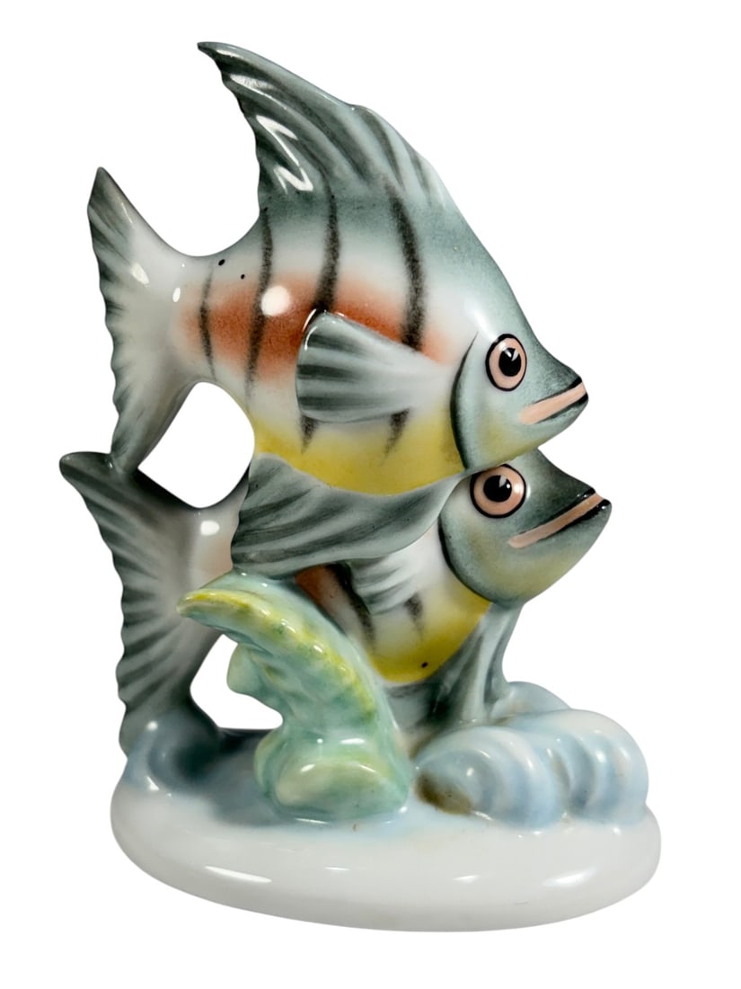Herend Hungary Double Tropical Fish Porcelain Fig: Herend Hungary hand painted porcelain figure depicting two tropical fish over a stylized wave base. Marked underside 15273/C, dated 1997. Dimensions: 4 X 3 X 2 in. Condition: Good overall condition