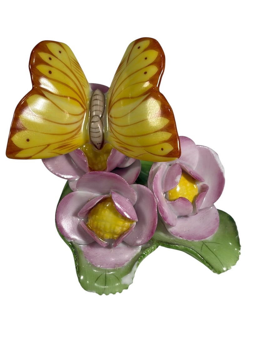 Herend Butterfly on Flowers Placecard Holder: Herend hand-painted Hungarian porcelain placecard holder in the Butterfly on Flowers pattern, model 9315-0-00/C. Features an orange butterfly perched among pink flowers on a molded green leaf base. Ma