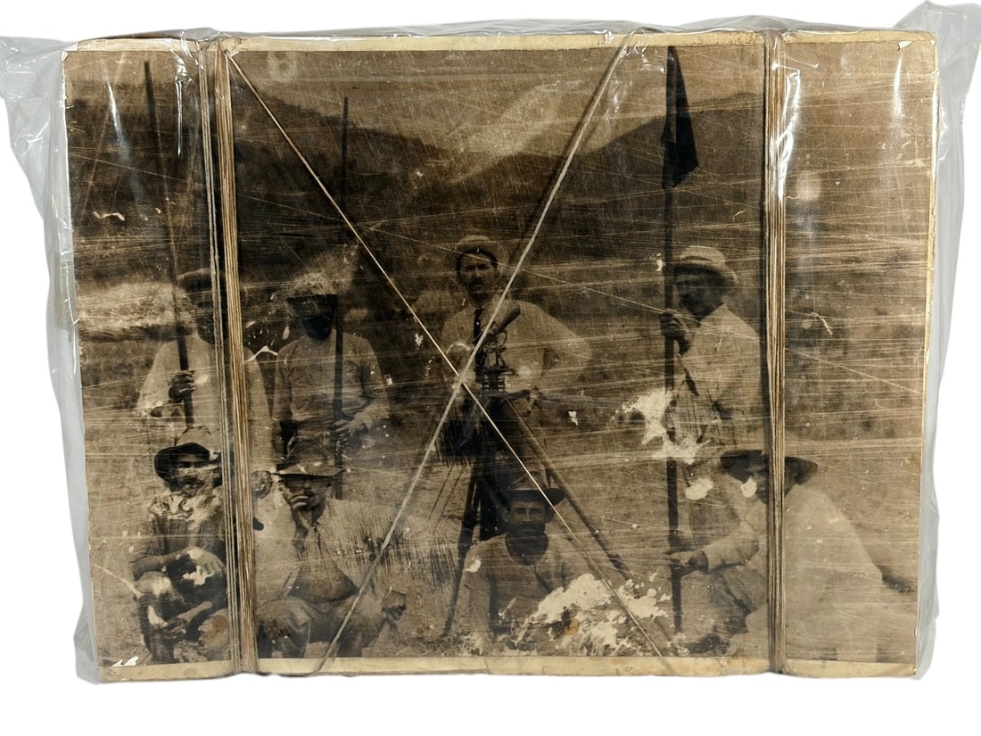 J. M. Fors 'Atado de Memorias' Package, 2000: Mixed media assemblage by J. M. Fors titled 'Atado de Memorias,' consisting of bundled sepia-toned photographic paper sheets wrapped in cord and enclosed in protective plastic. Dimensions: 12 X 15.5 X