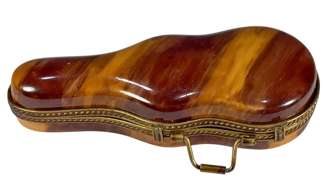 Limoges France Porcelain Guitar w Case Trinket Box: Hand painted Limoges porcelain trinket box in the form of a guitar with matching faux burl wood violin case. Hinged gilt metal mounts and clasp. Interior fitted to hold violin form box. Marked Limoges