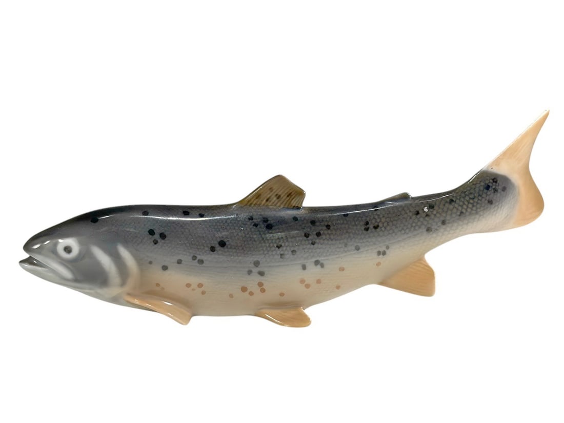 Royal Copenhagen Denmark Porcelain Trout Figurine: Royal Copenhagen porcelain trout figurine, model 2671, naturalistically decorated in blue-gray and peach tones with hand-painted detailing. Marked Denmark and numbered to underside Dimensions: 3.5 X 8