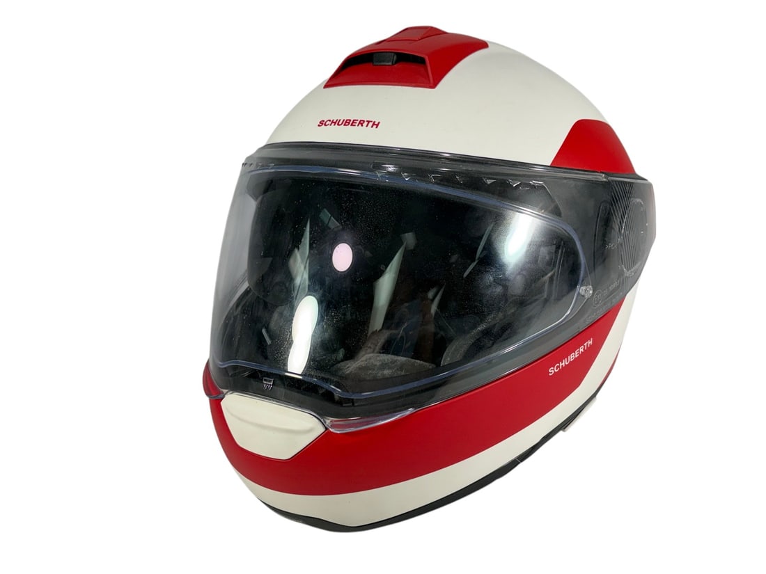 Schuberth C4 Pro Modular Motorcycle Helmet, size L: Schuberth C4 Pro modular motorcycle helmet in red and white finish, DOT FMVSS No. 218 certified, size L / 59. Features flip-up clear visor, integrated dark sun visor, ventilation system, and