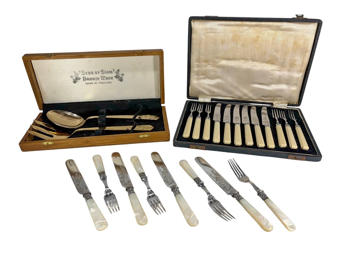 Assorted Flatware & Serving Utensils 22pc LOT: Assorted three-group flatware lot comprising a two-piece gilt bronze serving set marked Star of Siam, made in Thailand, a set of four knives and four forks with mother-of-pearl handles, and a set of