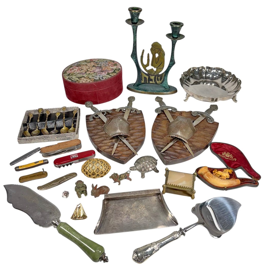 Assorted Decorative Objects & Collectibles 24pcs: Assorted group of twenty-four decorative objects including two heraldic wall plaques, a metal bowl, two metal serving pieces, a two-light candelabrum, a meerschaum pipe, a petit point covered box, six