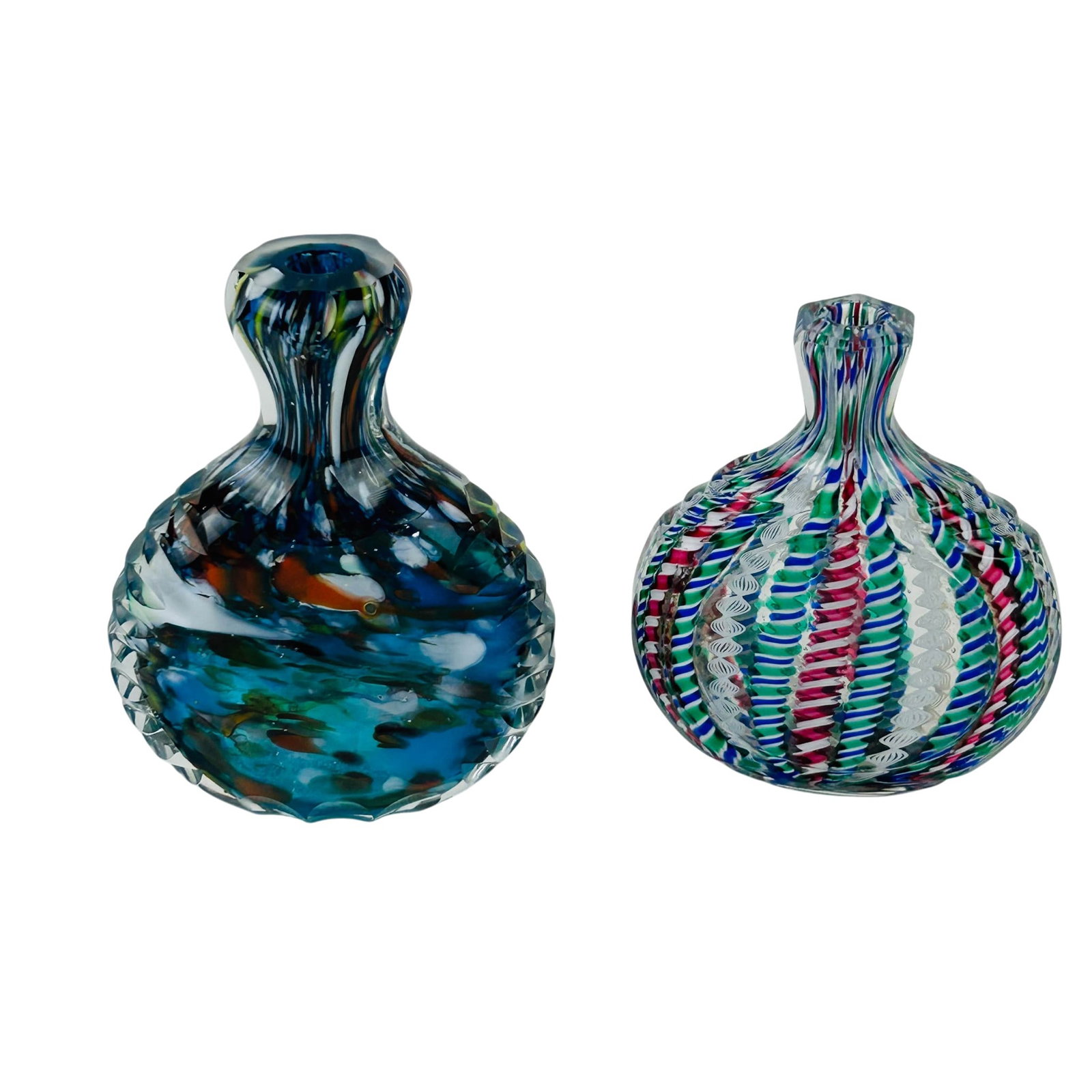 Murano Ribbon Cane & Speckled Art Glass Vases 2pc: Lot of two Murano Italian art glass miniature bud vases. Includes one clear glass example with multicolor latticino and twisted cane decoration in red, green, blue, and white, together with one facete