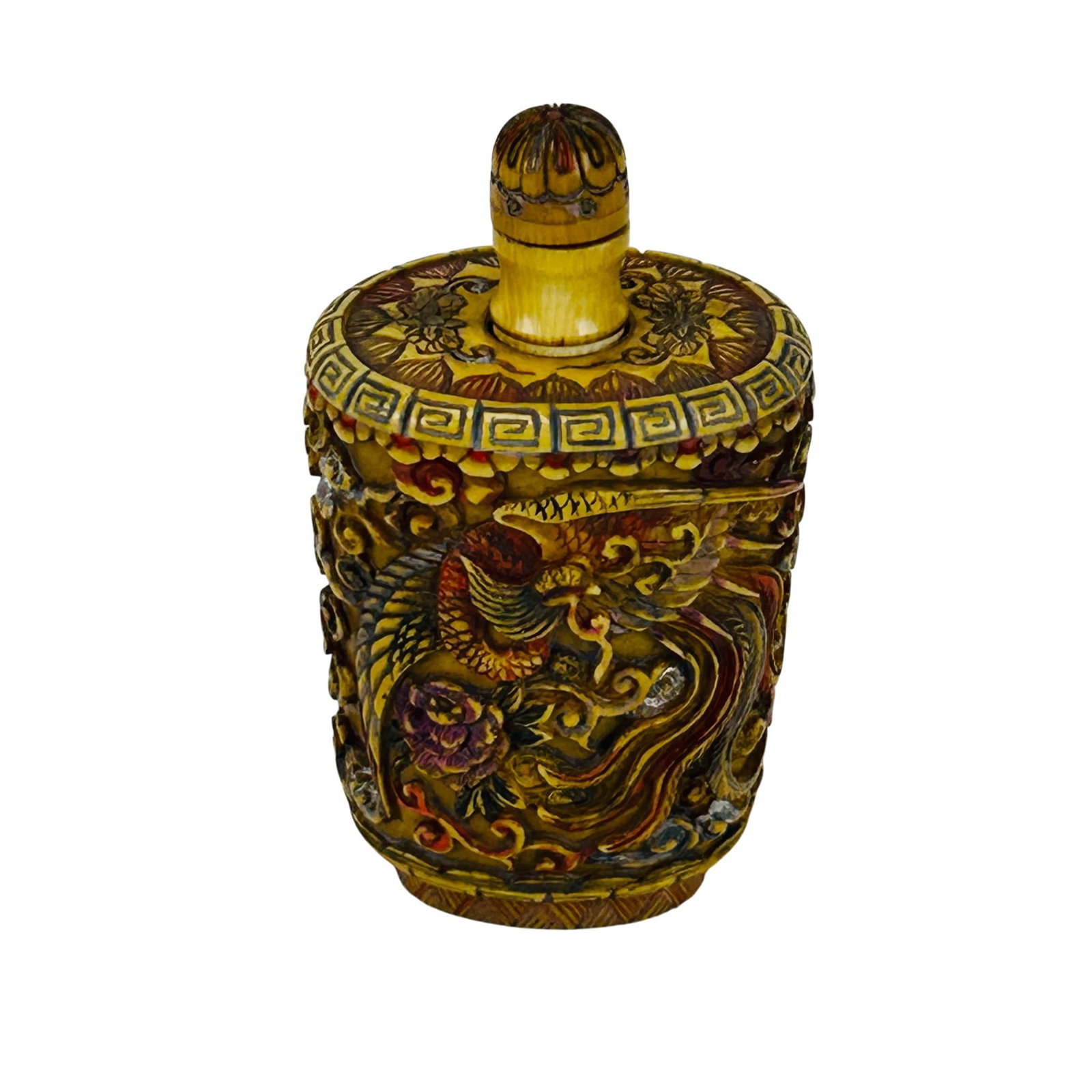 Chinese Carved Dragon & Phoenix Bird Snuff Bottle: Chinese carved resin snuff bottle with polychrome decoration depicting phoenix, dragon, clouds, and floral motifs in relief. Oval form with geometric border decoration and fitted stopper. Underside wi