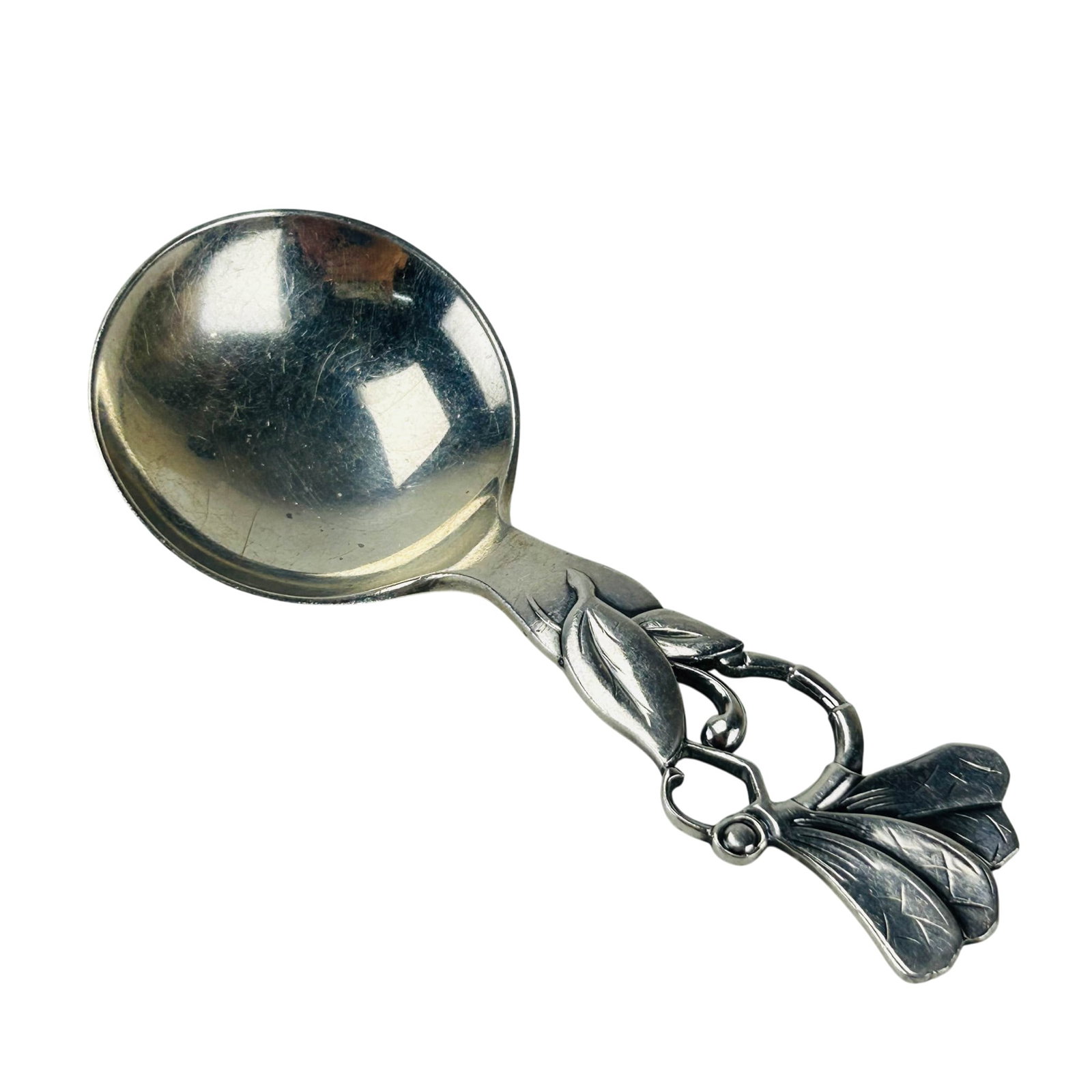 Frigast Sterling Denmark Dragonfly Caddy Spoon: Early 20th century Danish silver caddy spoon with plain circular bowl, the pierced handle formed as a dragonfly insect on a leaf. Designed by Poul C Lutken, Frigast , Copenhagen 1937. Measures
