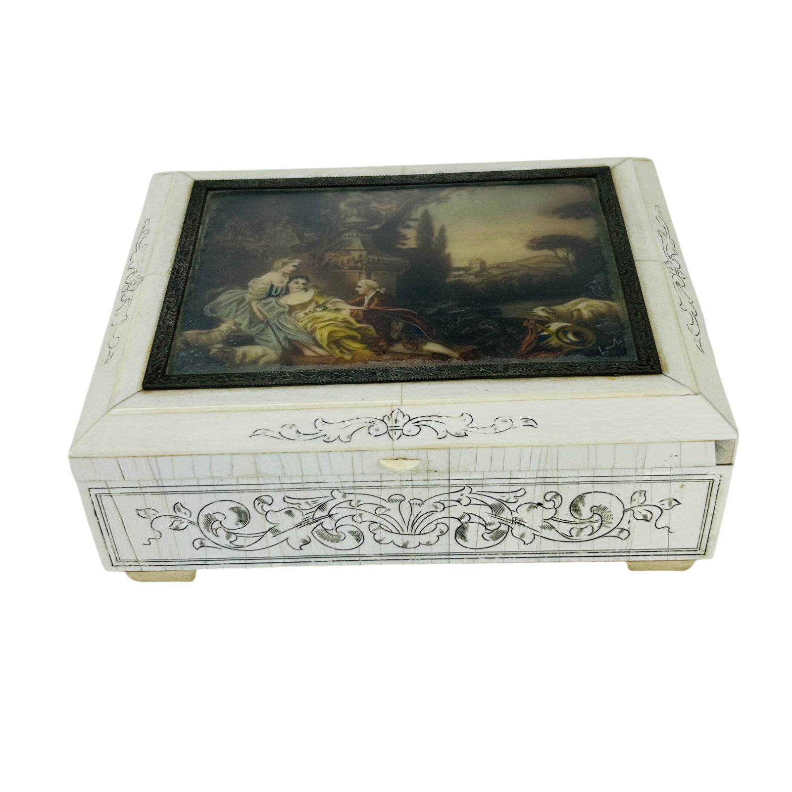 Faust Zigeunerbaron Musical Inlaid Jewelry Box: Decorative rectangular Swiss musical trinket casket with bone clad exterior and scrolling foliate ornamentation. Hinged cover inset with romantic figural tableau beneath glass accented with hand paint