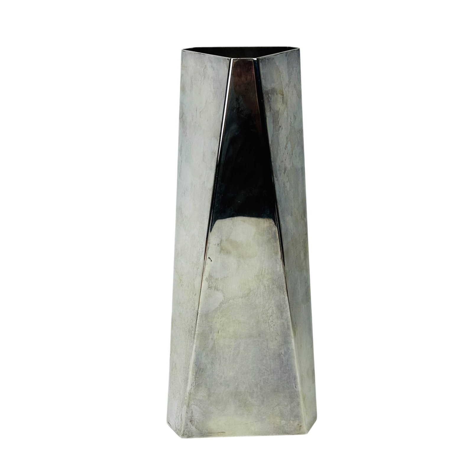 Ken Benson Trianon Geometric Silver Plated Vase: Modernist silverplate geometric vase having a tapered polygonal form with angled panels and reflective surfaces throughout. The architectural silhouette displays clean contemporary lines with a minima